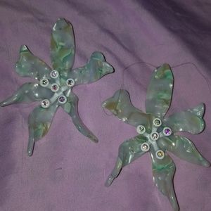 Lele Sadoughi large Water Lily earrings.